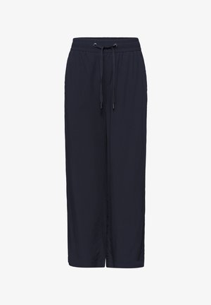 Pantalon large bleu marine pour femme avec ceinture élastique et cordon ajustable à l'avant.