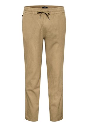 Beige linen blend pants with an elastic waistband and drawstring. Tapered leg design with smooth texture and no visible patterns.
