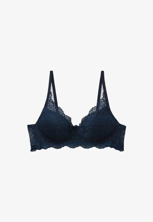 Soutien-gorge en dentelle bleu marine avec bonnets moulés, motif floral, bretelles réglables et bords festonnés au niveau du bandeau et du décolleté.