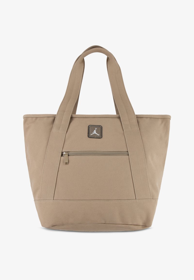 Τσάντα-τούτ από καμβά σε ταμπά χρώμα με διπλές λαβές, διαθέτει μπροστινή θήκη με φερμουάρ και μικρό λογότυπο ραμμένο μπροστά.