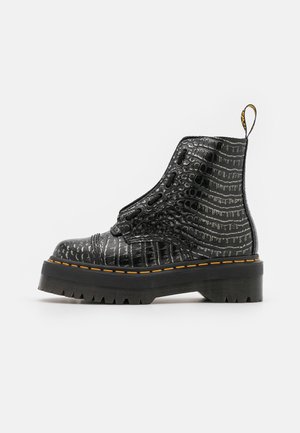 Enkellaarsjes met plateauzool - mottled black