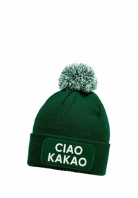 Green knit beanie with a fuzzy top pom-pom and a rectangular patch displaying "CIAO KAKAO" in white text.