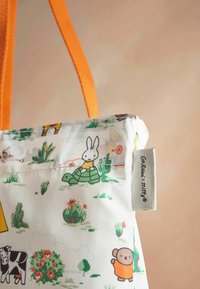 Reusable tote bag with vibrant orange straps. Features colorful animal-themed print on white fabric, including a rabbit and turtle.