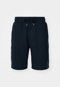 Navy blue shorts made of cotton blend, featuring an elastic waistband with drawstring, side pockets, and textured side panels.