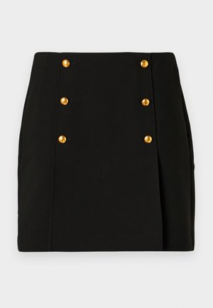 Black mini skirt with a fitted design, featuring a front panel with four gold buttons and a side pleat detail. Made of smooth fabric.
