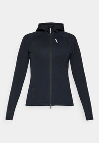 Schwarze, zipfelige Kapuzenjacke aus strukturiertem Material, mit langen Ärmeln, schlanker Passform und einer kleinen, mit Reißverschluss versehenen Tasche auf der Brust.