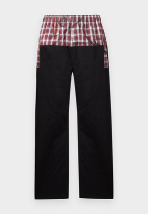 Straight-leg pants with black lower fabric and red-white plaid elastic waistband and upper panel.