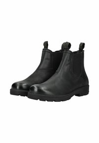 Botas Chelsea de cuero negro con paneles laterales elásticos, punta redonda y tiradores. Acentos de tejido texturizado en la parte superior de las botas.