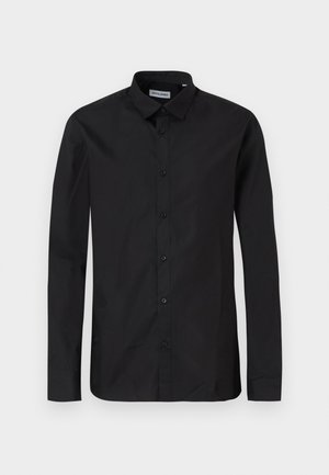 Black long-sleeve button-up shirt with a classic collar, made of smooth fabric, featuring front buttons and a regular fit design.