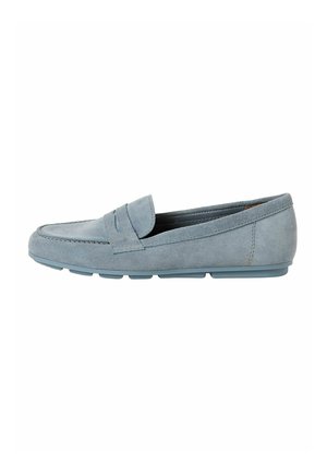 Light blue suede moccasin with stitched detailing, flat rubber sole, and a slip-on design. Features a small top flap for added detail.