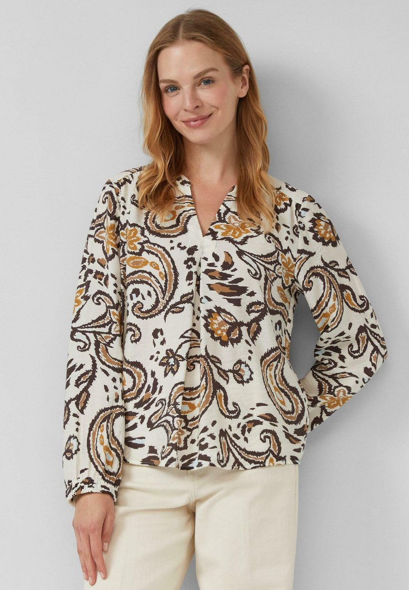 Langdraagbare blouse met lange mouwen in roomkleur met een paisleypatroon in tinten van bruin en mosterd. V-halsontwerp met een ontspannen pasvorm en gestructureerde stof.