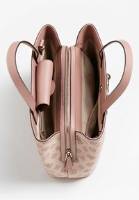 Roze leren handtas met een ritssluiting, voorzien van een patroonexterieur, dubbele handvatten en een ruime, met stof gevoerde binnenkant met zakken.