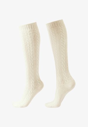 Calcetines hasta la rodilla en un color crema claro con un patrón de punto acanalado texturizado y puños acanalados. Fabricados con un tejido suave para mayor comodidad.
