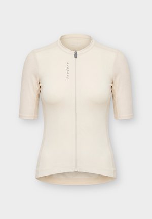 Beige korte mouwen fietsjersey met voorrits en gestructureerde mouwen, met verticale "Isadore" branding op de borst.