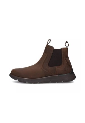 Botas de tobillo de cuero marrón con paneles laterales elásticos, lengüetas y suela de goma texturizada. Punta ligeramente redondeada y diseño acolchado.