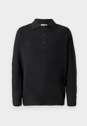 Zwarte gebreide pullover met een gestructureerde afwerking, voorzien van een klassieke kraag en een knoopsluiting met drie knopen. Lange mouwen met geribde manchetten.