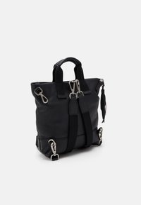 Jost X CHANGE BAG MINI - Handbag - black