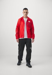 The North Face WINDSTREAM SHELL - Windbreakers - high risk red