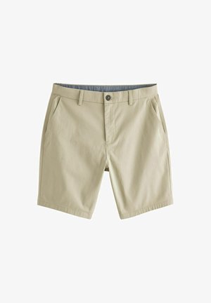 Vaaleat beiget shortsit, jotka on valmistettu kevyestä kankaasta. Niissä on sivutaskut, nappisulku ja yksinkertainen, siisti muotoilu ilman kuvioita.