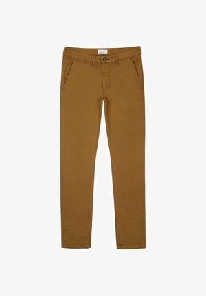 Pantalons chinos marron coupe slim avec poches avant, passants pour ceinture, fermeture par bouton et étiquette de marque visible à l'intérieur de la ceinture.