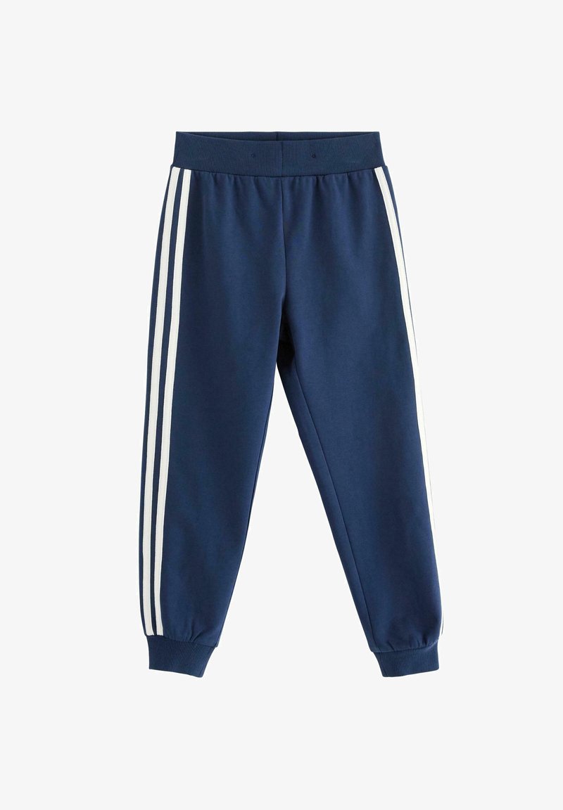 Pantaloni della tuta blu navy con strisce laterali bianche, vita e polsini elastici, realizzati in tessuto morbido. Presentano una consistenza liscia.