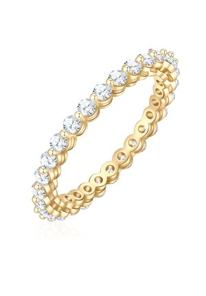 Zlatni prsten s okruglim prozirnim draguljima, postavljen u delikatnu, prozračnu traku s kružnim akcentima, koja prikazuje neprekinuti dizajn.