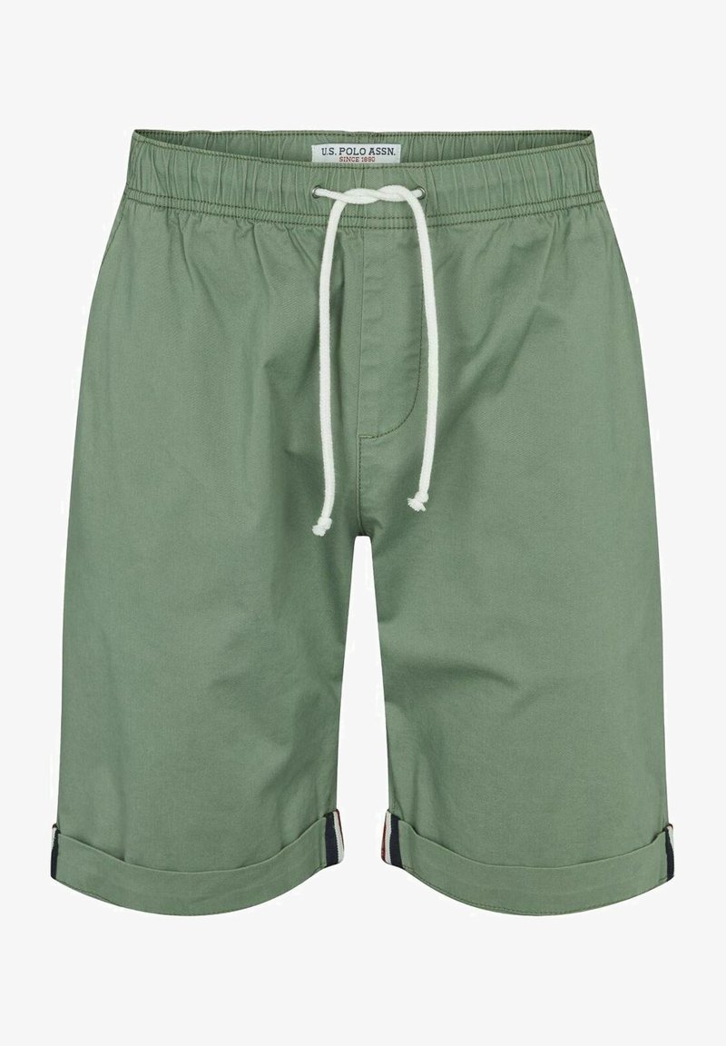 Zelené bavlněné šortky s elastickým pasem, šňůrkovým zavíráním a ohrnutými lemy. Obsahují přední kapsu a barevně kontrastní detaily.