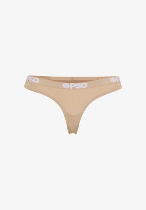 Beżowe stringi z miękką teksturą i szerokim białym paskiem z logo „PSD”. Prosty design, niskie stan.