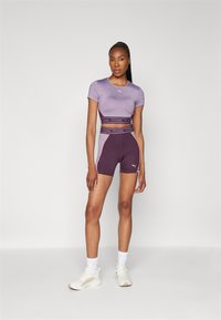 Puma STRONG BABY TEE SHORT - Sportfelső - pale plum
