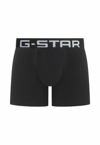 Black boxer briefs with a G-Star branded elastic waistband. Smooth texture and fitted shape, designed for comfort and support.