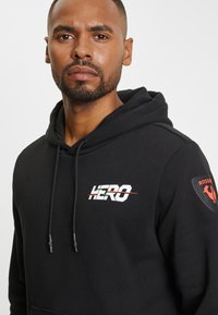 Rossignol HERO  - Bluza z kapturem