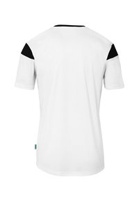 Witte T-shirt met korte mouwen en zwarte schouderaccenten. Glad stof, ronde hals, reguliere pasvorm, achteraanzicht. Minimalistisch ontwerp, geen patronen.