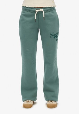 Pantaloni felpati verdi in cotone con cintura regolabile, stampa del logo sulla coscia sinistra e design a gamba dritta rilassata.