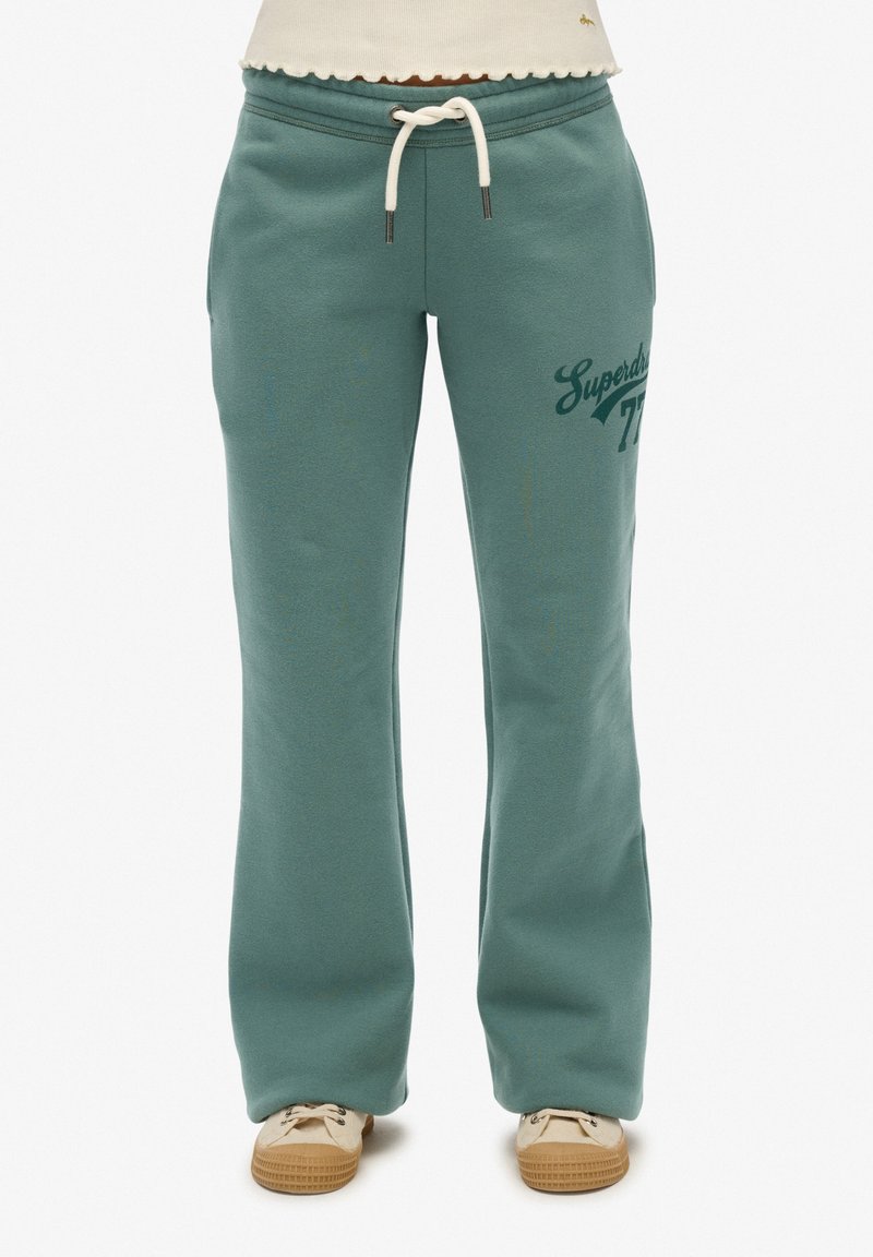 Groene katoenen sweatpants met een verstelbare tailleband, logo-print op de linkerdij en een relaxed recht model.