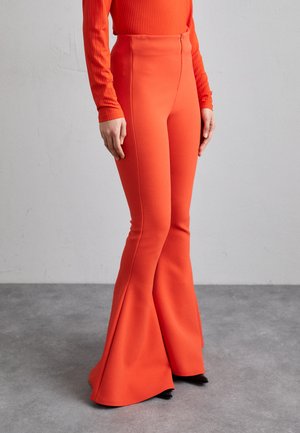 FLARED PANTS - Trousers - red