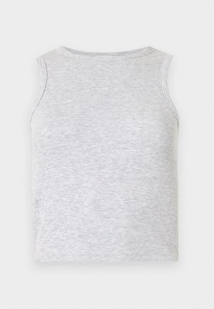 Gaiši pelēks bezroku ribots topiņš ar apaļu izgriezumu, uzlikts uz baltas virsmas.