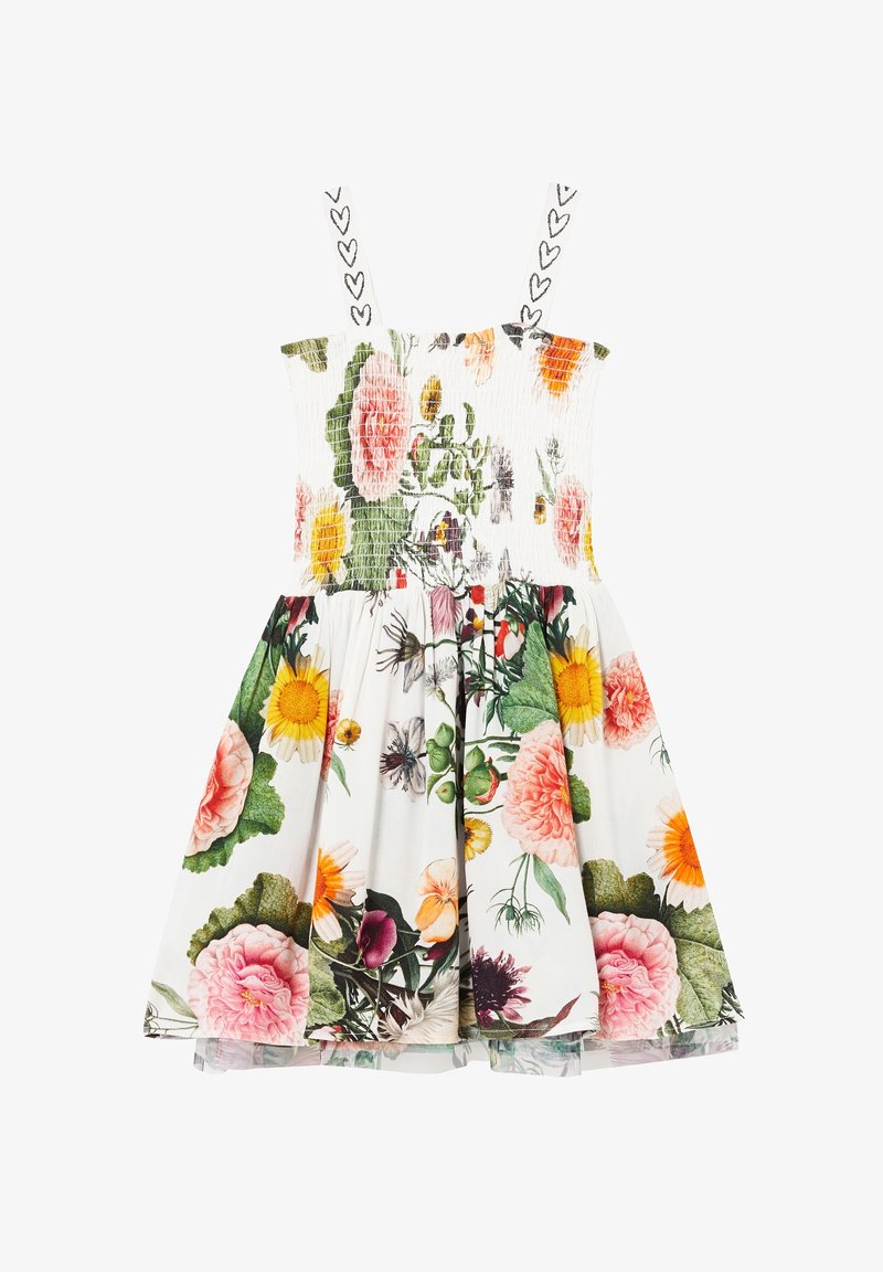 Blommig klänning med smockad överdel, spaghetti-band och utsvängd kjol. Har flerfärgade blommönster på en vit bakgrund.