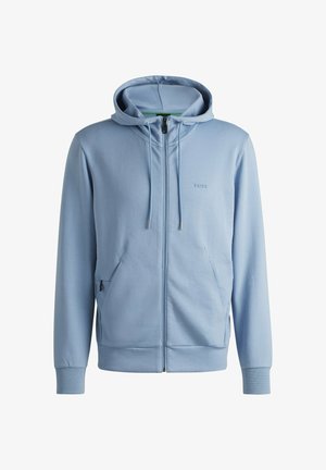 Jasnoniebieska bluza z kapturem na zamek błyskawiczny, z sznurkiem do regulacji, dwoma bocznymi kieszeniami, rygorystycznymi mankietami i dołem, z tonowym logo na klatce piersiowej. Miękki materiał.