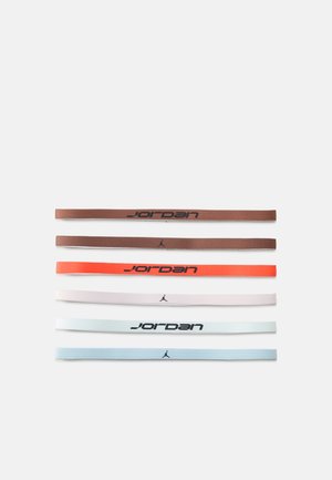 Set of six fabric wristbands in brown, orange, white, light blue, and patterned blue, each with "Jordan" logo in black or white.