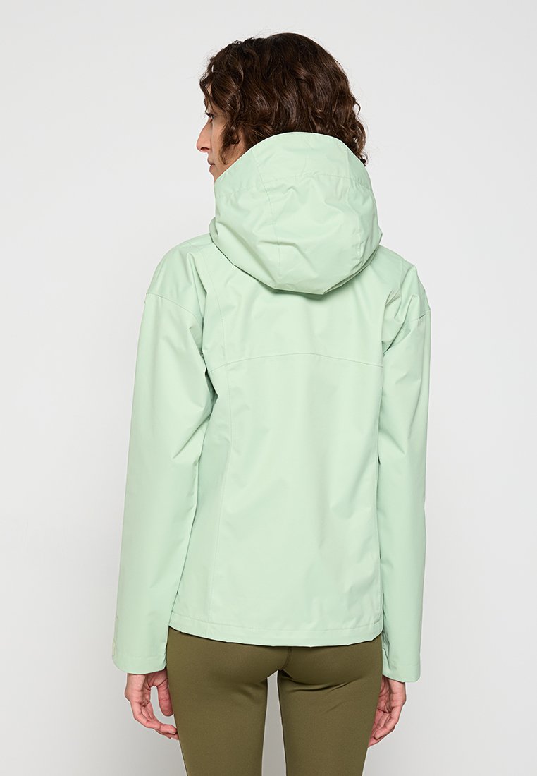 Veste imperméable vert clair avec capuche, dotée d'une texture lisse et d'un design simple. La vue de dos montre une couture sur les épaules.