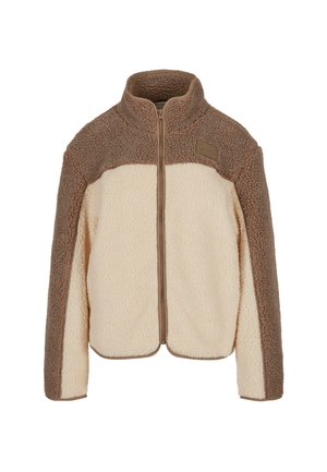 Fleece jacket with a high collar, featuring a cream body and chocolate brown accents. Zipper front and textured surface.