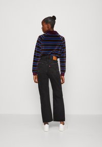 Levi's® RIBCAGE STRAIGHT ANKLE - Ravne kavbojke - skewed break