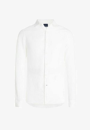 Chemise blanche en lin à manches longues avec fermeture à boutons et col classique, présentée sur un fond blanc uni.