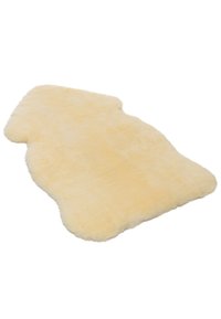 Helles beige Schaffell-Teppich mit einer weichen, flauschigen Textur, in unregelmäßiger Form und mit glatter Unterseite.