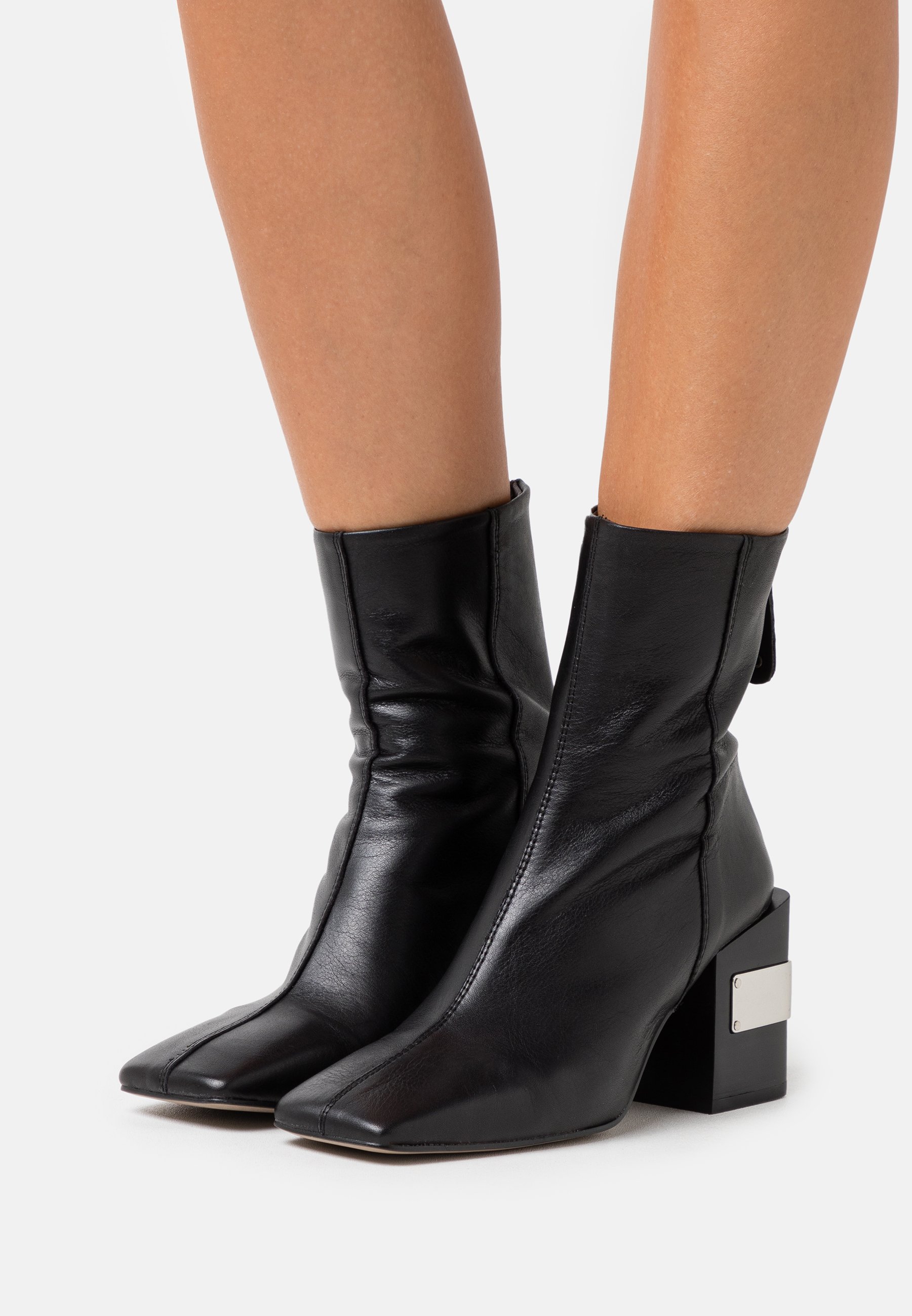 avery microfiber wedge bootie