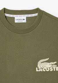 Lacoste Ikdienas džemperis - khaki pollen
