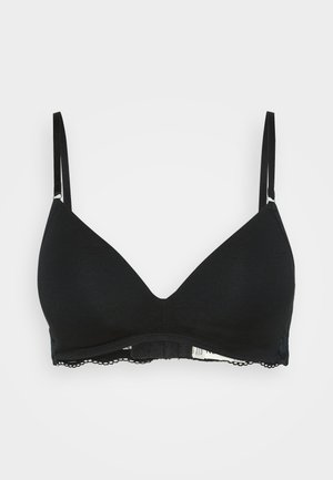 Schwarzer, dreieckiger Bralette aus weichem Stoff mit dünnen, verstellbaren Trägern. Spitzendetails am Bund sorgen für Textur und Akzent.