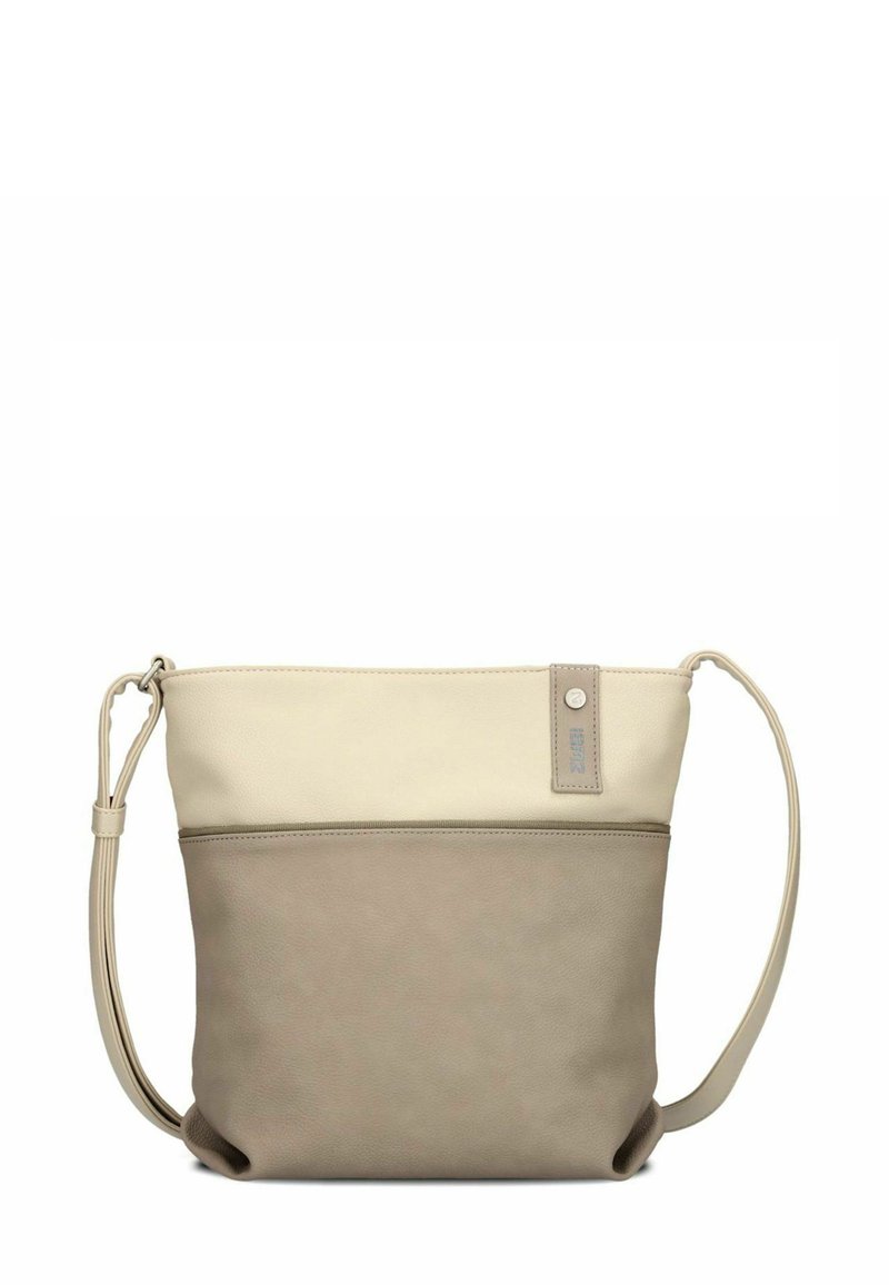 Beige und hellbraune Leder-Umhängetasche mit verstellbarem Riemen, Reißverschluss oben und einem kleinen Akzentanhänger auf der Vorderseite. Glatte Textur.