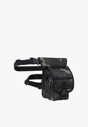 Camouflage-patterned leg bag with multiple compartments, adjustable straps, buckle, and zipper for secure storage and hands-free carrying.