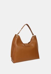 Bruine leren hobo tas met een gladde textuur, een vlakke bodem en een schouderband. Beschikt over een voorvak en een minimalistisch ontwerp.